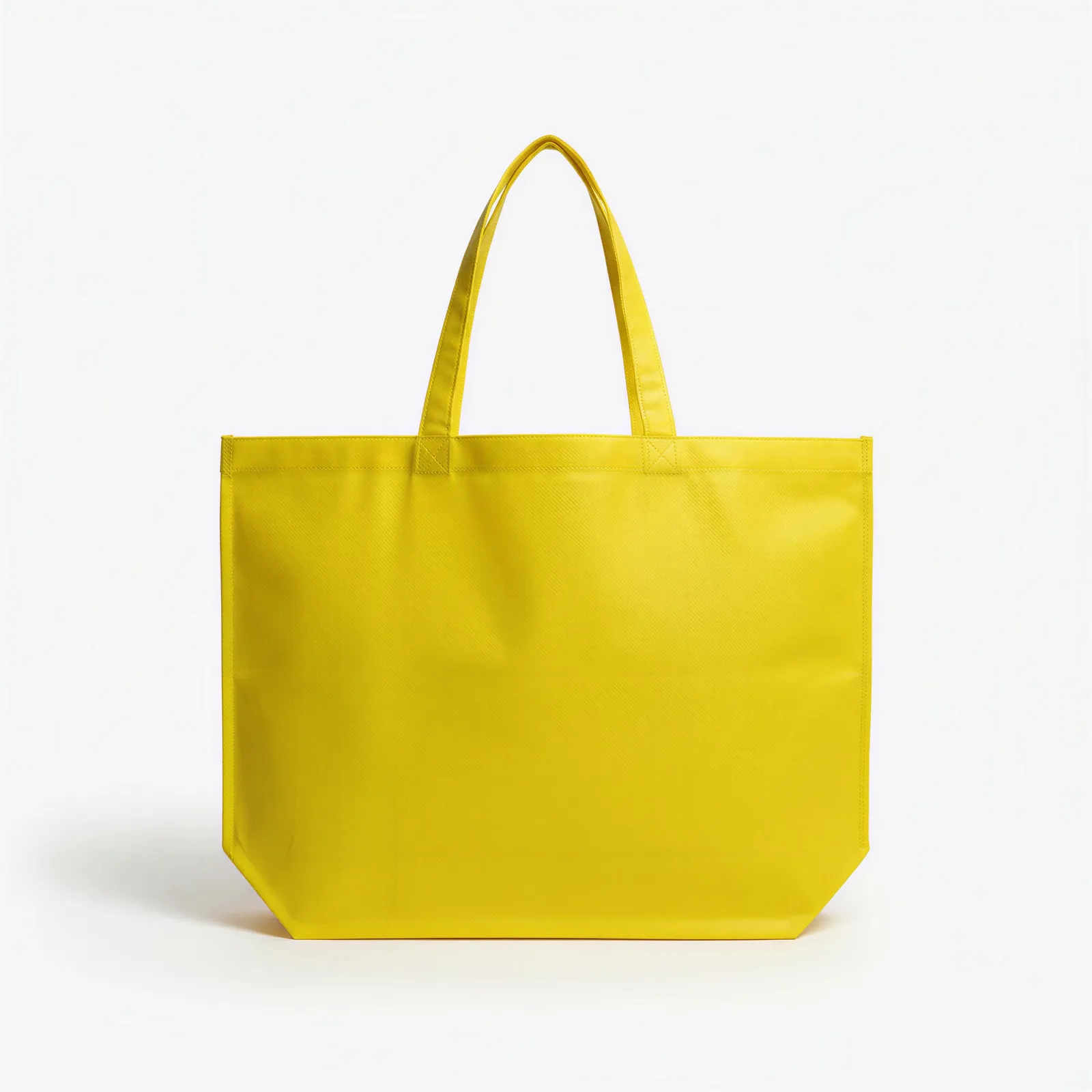 Tote ancho de no tejido amarillo, reverso